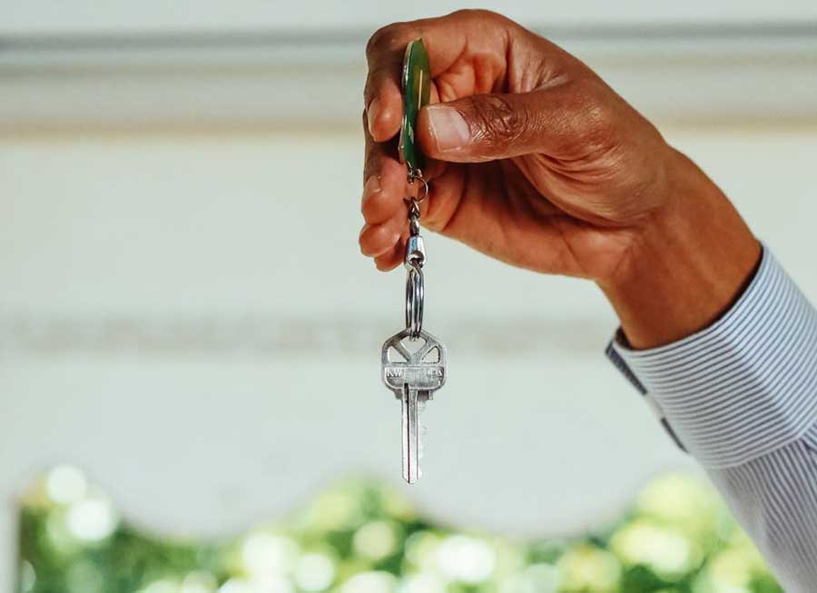 Person holding keys